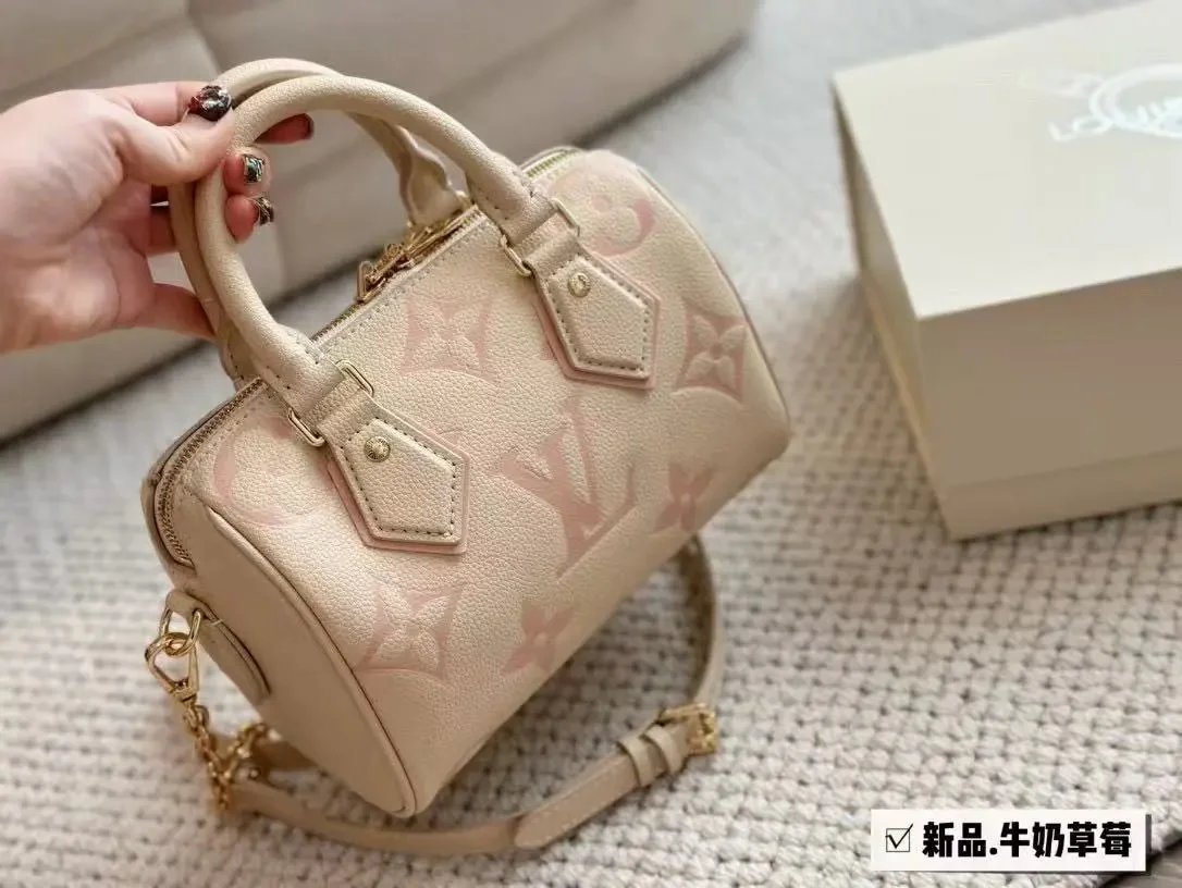Louis Vuitton LV Speedy Bandouliere 20 Empreinte Leather Handbag Beige and Pink